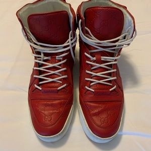 **GUCCI GUCCI GUCCI** Red Men’s hightops.